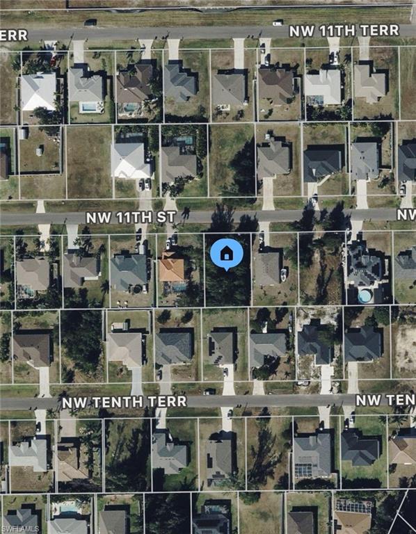Quarter acre lot east of Burnt Store road. Surrounded by new construction homes all around. Desirable neighborhood with power pole on site and paved road. Homes on either side. Good investment for developers or investors. Call today for more information. Hablo español!
