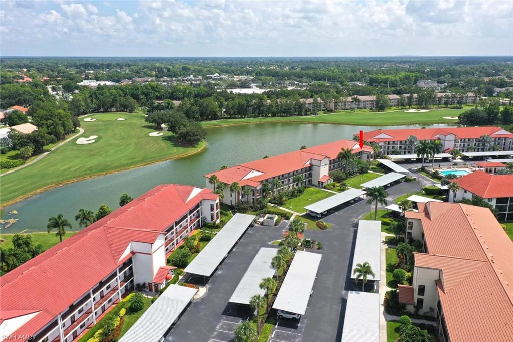 A beautiful view of the golf course, a sparkling lake and the glorious southwestern sunset will be yours in this charming 2 bedroom, two bath with full golf membership condo in the newly renovated Countryside Golf and Country Club. Being sold turnkey with tasteful furnishings throughout, this home also features a glassed in rear lanai to give you more space for relaxing or entertaining. New luxury vinyl plank flooring and all new impact windows, you will be able walk right in and make this your dream home. As an added bonus, the assessment for club and pool renovations has already been prepaid by the sellers so that the new owners will not have to pay the assessment. There is something for everyone at Countryside -golf, tennis, outdoor concerts, weekly dances, Bingo, Name that Tune, wine tasting, canasta, Mahjong, field trips, theme nights and so much more. Add to this the proximity to major highways, shopping, fine restaurants, 5th Avenue and the glorious Gulf of Mexico, it really doesn't get any better than this!!!