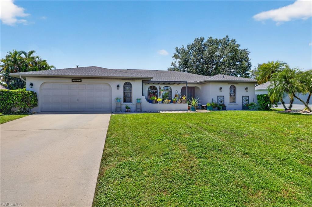 *Welcome Home! Do you like to entertain? Come take a peek at this gorgeous, comfy, cozy, "Florida Coastal" vibe Cape Coral pool home. ***NO FLOOD ZONE here folks! (X-500 ~ No Flood insurance required)***Property Features: New Roof in 2023, A/C in 2021, New fence & gates in 2022.

This Beautifully remodeled, very private, Southern exposure pool home located in desirable SE Cape Coral offers over 2,000+ square feet of thoughtfully designed interior living space & features a spacious open floor plan. Step inside to discover a light, bright, and inviting "Farm-House" inspired interior with modern updates throughout that is perfect for both everyday living and entertaining large gatherings. 

The open-concept living and dining areas flow seamlessly into the beautifully appointed open kitchen featuring stainless appliances, complete with a custom, exotic, 10 ft granite island - creating a warm and welcoming space for family and friends to gather. The Split BR floor plan offers guests or family to have their own private space including a large, separate family room(or dining room) to socialize, relax or even to create a fun game / music / sports viewing or wine bar room? 3rd BR currently serves as a spacious office w/ daybed for guests.

One of the true highlights of this property is the amazing private backyard, offering a peaceful retreat, custom landscaping along with your own private banana trees, with plenty of room to relax and enjoy the Florida lifestyle. Step outside from Primary BR, living room or kitchen sliding doors which open all the way out to the expansive, screened-in covered lanai and sparkling pool, where you can spend your days with a refreshing swim, entertaining guests, al fresco dining, outdoor grilling, enjoying cocktails, watching tv or simply enjoying your own private piece of paradise.

Located in Southeast Cape Coral with close access to shopping, dining and entertainment areas, this exceptional home combines style, comfort, privacy, and peace of mind. Whether you’re looking for a full-time residence, seasonal getaway, or investment property, this beautifully remodeled pool home is a must-see!