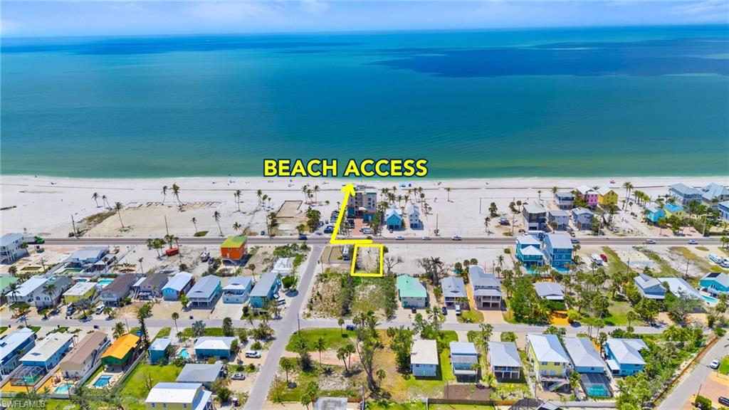 One or more photo(s) has been virtually staged, AI generated or rendered.  WEEKLY RENTAL ZONED. AMAZING GULF VIEWS and STEPS TO THE BEACH WITH ROOM TO BUILD YOUR OWN PRIVATE RETREAT! Measuring approximately 45 feet wide by 125 feet deep, this parcel is ideally situated just a short walk to Beach Access #16 at Dakota Avenue in one of Fort Myers Beach’s most walkable mid-island locations. Zoned Residential Multifamily (RM), it offers flexibility for single-family or duplex construction (subject to town regulations) and presents a rare opportunity to build new in an established beachside corridor. The lot provides just the right amount of outdoor space to incorporate features like a private pool and spa, outdoor kitchen, shaded seating area, or detached guest casita—everything you need for relaxed island living without excess maintenance. The original structure was removed post-Hurricane Ian, utilities are available at the street, and the surrounding area continues to see high-quality redevelopment. Enjoy easy, direct beach access without paying beachfront prices—along a quieter stretch of the island where the crowds are few, the pace is slower, and the shoreline feels like your own.