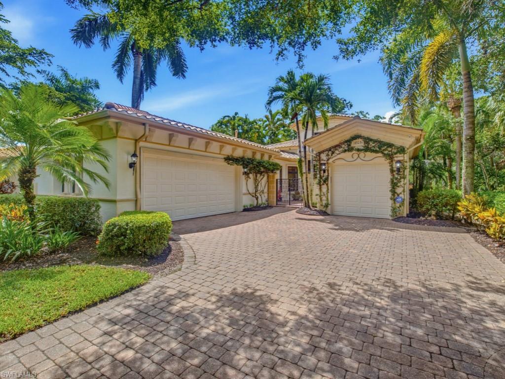 Located in the prestigious Mediterra Golf & Beach Club community of Naples, Florida. Set in an extraordinarily private setting, surrounded on three sides by the estuary and natural preserve, this extensively updated Villalago residence offers a rare sense of seclusion and connection to its natural surroundings. A gated courtyard introduces the home, opening to a dramatic foyer crowned by a custom beamed and illuminated 20-foot ceiling. Beyond, expansive windows, rich wood flooring and 12-foot ceilings fill the living and dining spaces with natural light, while the great room centers on a contemporary electric fireplace framed by illuminated custom display cabinetry. The reimagined kitchen is equally impressive, featuring a generous island, Sub-Zero and Bosch appliances, Thermador refrigeration drawers, a concealed pull-out coffee bar with faucet, walk-in pantry and added windows capturing tranquil preserve views. The private primary retreat continues the sense of luxury with an illuminated tray ceiling, bay-window sitting area and direct lanai access. Its spa-inspired bath is a destination of its own, appointed with a built-in infrared sauna, steam shower, freestanding soaking tub, heated towel warmer and convenient secondary laundry. Two additional en-suite bedrooms occupy a separate guest wing, while a dedicated den with custom built-ins offers an elegant work-from-home retreat. Control4 home automation provides integrated control of lighting, HVAC, security and internet. Outdoors, the expansive screened lanai offers generous areas for lounging and dining overlooking the private pool and raised spa, where the estuary and natural preserve wrap around three sides to create an exceptionally secluded backdrop. Completing the residence is an attached three-car garage, including a recently added third bay. Mediterra is a prestigious luxury golf & beach club community featuring two championship Tom Fazio golf courses for avid golfers, a private beach club with a restaurant & bar, multiple tennis courts, pickleball & bocce, a fitness center, pristine bike & jogging trails, and luxurious dining at the private country club restaurant. The Mediterra Beach Club offers an escape to a 10,000 sq. ft two story private oceanfront paradise on the Gulf of Mexico.