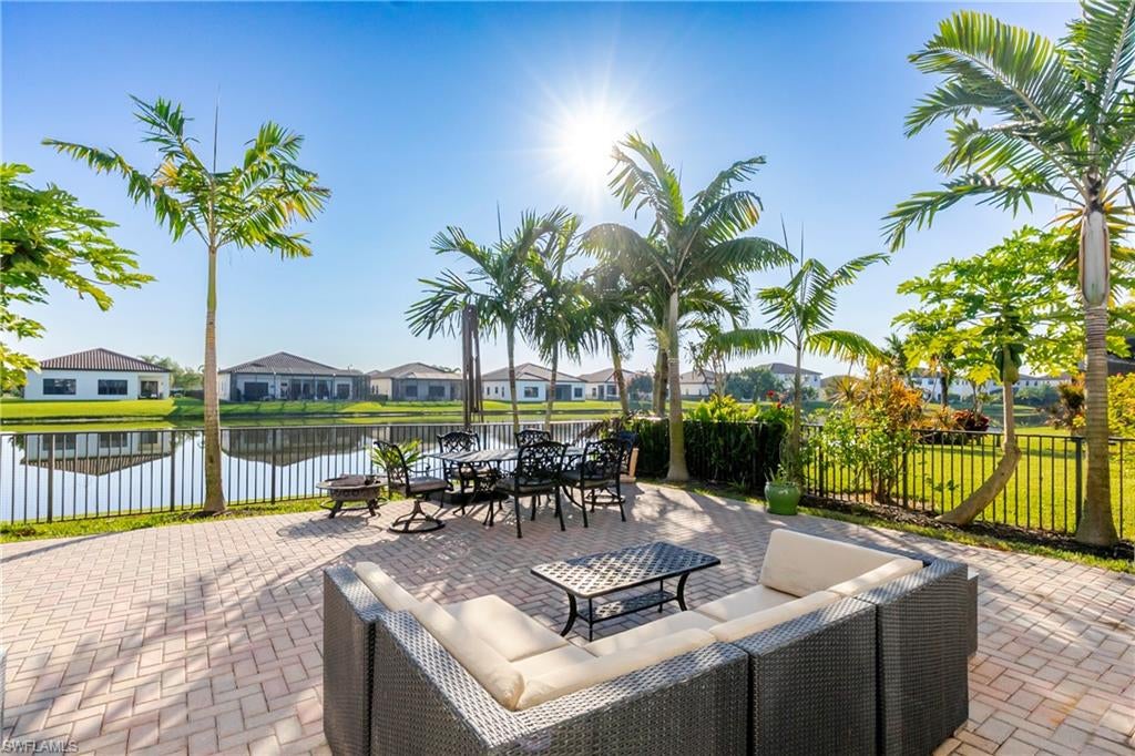 Welcome to this beautifully designed 4-bedroom, 3-bathroom unfurnished home in the desirable Maple Ridge neighborhood of Ave Maria. This spacious residence features an open-concept floor plan with plenty of natural light, creating an inviting setting for everyday living and entertaining. The modern kitchen offers sleek countertops, stainless steel appliances, ample cabinetry, and a functional layout that opens to the spacious living and dining areas. The private primary suite provides a relaxing retreat with a luxurious en-suite bathroom and generous closet space. Step outside to enjoy the private backyard overlooking the lake, offering a peaceful setting for outdoor entertaining, relaxation, and enjoying the beautiful surroundings. Residents of Maple Ridge enjoy access to a variety of community amenities, including a resort-style pool, fitness center, clubhouse, tennis courts, and walking trails. Conveniently located near Ave Maria's schools, shopping, dining, parks, and town center, this home offers comfortable Florida living in a vibrant and welcoming community. Offered unfurnished and ready for its new owners!