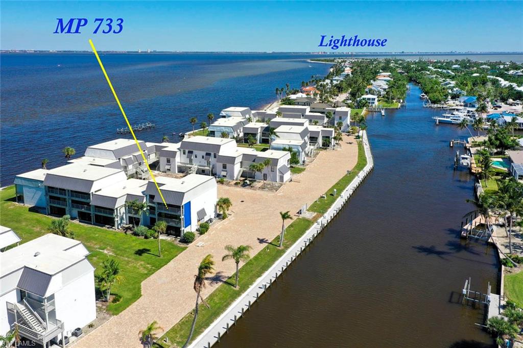 Panoramic water views. Top-floor privacy. Resort-style amenities. Gulf access. This exceptional corner 2-bedroom, 2-bath condo at highly sought-after Mariner Point offers the opportunity to enjoy the Florida waterfront lifestyle from one of the community’s most desirable locations.
From the moment you step inside, breathtaking Bay and canal views take center stage. As a top-floor, corner residence, this condo combines beautiful vistas with added privacy and a peaceful setting—creating a private retreat where you can relax, entertain, and enjoy the beauty of Southwest Florida every day.
For boaters, the location is hard to beat. Low owner dockage fees and convenient access to San Carlos Bay and the Gulf of Mexico make it easy to turn an ordinary day into a boating adventure. Head out for a morning on the water, spend the afternoon at the beach, and return home in time to watch the sunset over the bay.
There’s plenty to enjoy without ever leaving the community. Mariner Point features two sparkling pools, tennis and pickleball courts, boat docks, a fishing pier, and beautifully maintained grounds—everything you need to embrace the laid-back Florida lifestyle.
And when you're ready for sand between your toes, the Gulf beach is just moments away, offering endless opportunities for swimming, shelling, boating, fishing, and soaking up the sun.
Whether you're looking for a full-time Florida residence, a seasonal getaway, or a property with rental potential, this waterfront condo offers an exciting opportunity to own a slice of the coastal lifestyle.
Come experience the views, the boating, the amenities, and the laid-back coastal lifestyle that make Mariner Point special. Your waterfront escape is waiting.