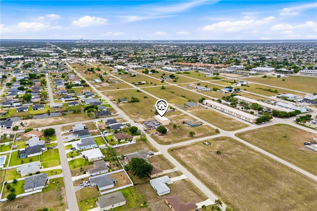 Prime Cape Coral Commercial Opportunity – Exceptional investment opportunity in the rapidly growing Northeast Cape Coral area! Located at 1010 NE 9th Street Unit A, Cape Coral, FL 33909, this commercial property offers excellent visibility, easy access, and a strategic location near major roadways, residential communities, and expanding commercial developments. The sale includes the existing commercial property. Whether you're an owner-user, investor, or developer, this package presents a rare chance to secure additional land in one of Cape Coral's fastest-growing corridors. With continued growth throughout Cape Coral and increasing demand for commercial space, this property offers outstanding potential for a variety of business uses. Don't miss the opportunity to own in a prime location with endless possibilities for future growth and income generation.