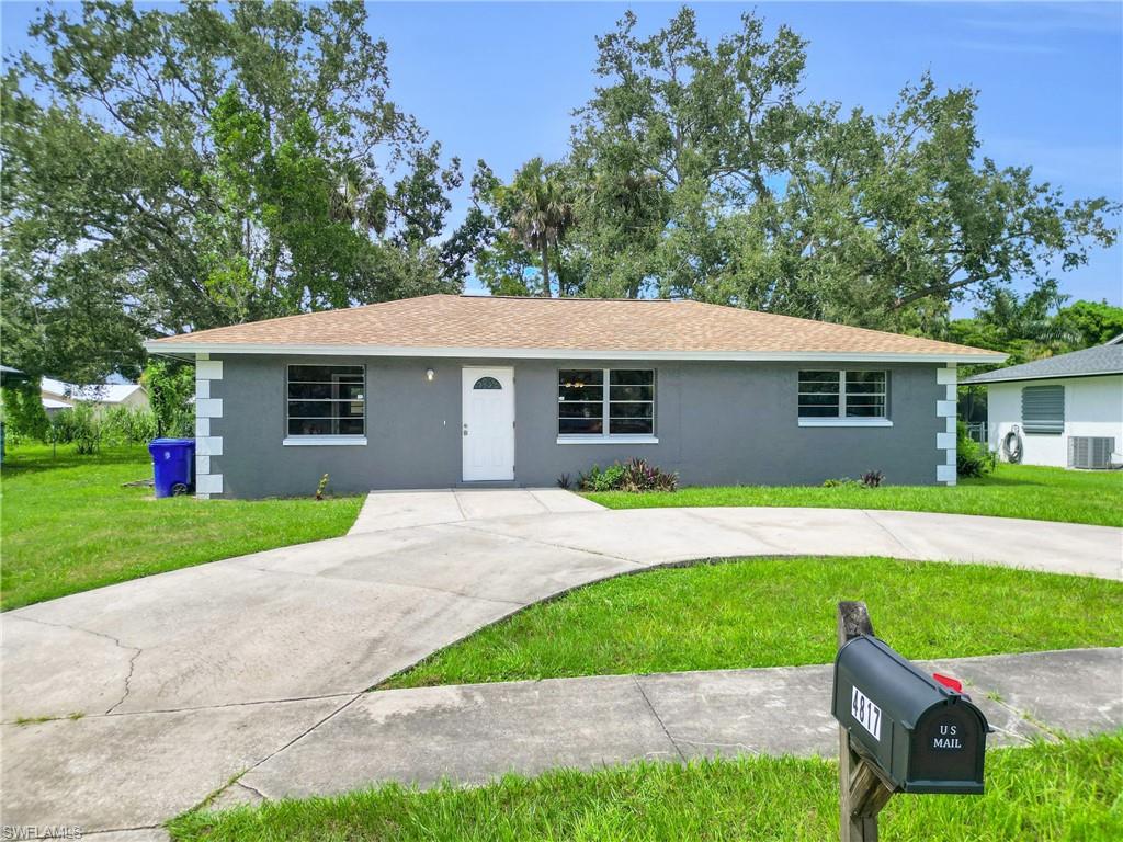 Welcome to 4817 Zana Drive. Charming 3-bedroom, 2 full bath home in the heart of Fort Myers. Situated on a quiet street, this home offers plenty of living space including an added, spacious den. Recently updated with a new roof, new kitchen plumbing with garbage disposal, and a new backyard fence. The open layout is filled with natural light creating an inviting atmosphere. The private backyard overlooks a serene canal and is ideal for entertaining or adding a garden. A loop driveway provides easy access for parking multiple vehicles. This home is conveniently located just minutes from the Fort Myers River District, shopping, dining, schools, and I-75. Perfectly suited for a primary residence or investment property. Don't miss your opportunity to make this gem your own.