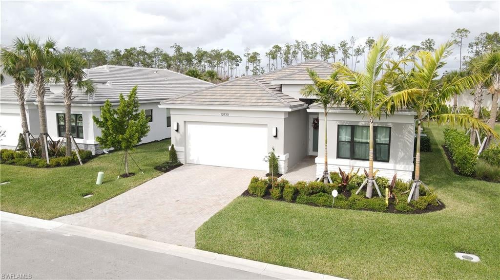Stunning Pool home with 2,659 total square feet of luxurious living space on this "Canyon" model, with lots of upgrades, featuring 3 beds plus a den/office, 3 full baths, stainless steel appliances, quartz countertops, impact-resistant windows and doors and a 2 car garage, screen in patio and private pool with complete privacy wall, large end of street lot. The master suite is very private with two walk-in closets and a large master bath with dual sinks and oversized mirrors. Rivercreek is equipped with gas appliances, streetlights, and sidewalks for your safety. RiverCreek offers an unparalleled lifestyle with its extensive amenities, the 12,000 square foot Clubhouse has an Indoor Sports Complex, Resort Style Pool, Fitness Center, Event Room, Catering Kitchen, Card Salon, Sports Lounge, Fire Pit, Playground, Splash Park, and Lighted Courts for Pickleball, Tennis courts, and Bocce, resort-style pool, state-of-the-art fitness center, kids pool, cabanas, the home is within walking distance to all amenities. Just minutes to Miramar outlets with plenty of shopping and dining options! Also, Hertz Arena, Coconut Point, Gulf Coast Town center, Florida Gulf Coast University are just minutes away. Schedule your showing today!