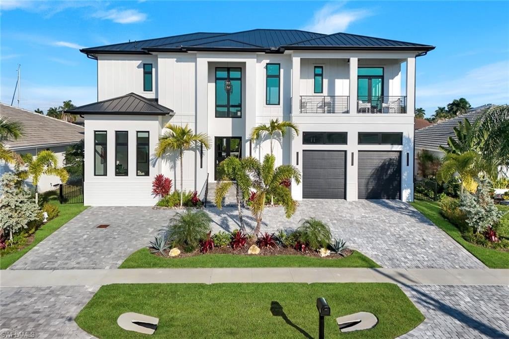 PRICED TO SELL – EXCEPTIONAL MARCO ISLAND WATERFRONT OPPORTUNITY! An incredible opportunity to own a custom-built waterfront residence offering modern coastal luxury, superior construction, and premier boating access at an exceptional price point. Thoughtfully designed with clean architectural lines, upscale finishes, and expansive living spaces, this home seamlessly blends sophisticated design with the relaxed elegance of island living. Constructed with solid concrete block on both levels, the residence offers outstanding quality, strength, and durability. An elevator servicing every floor provides effortless convenience and long-term accessibility.
Boating enthusiasts will appreciate the property's premier location, featuring a private dock, two boat lifts, and quick, direct water access to the Ten Thousand Islands and Gulf of Mexico.
Expansive interiors, tranquil waterfront views, and thoughtfully designed entertaining spaces create an inviting setting for both everyday comfort and entertaining. Ideally situated just minutes from Marco Island's beautiful white-sand beaches, waterfront dining, and boutique shopping, this residence delivers the very best of the island lifestyle.
An exceptional value in today's waterfront market, this home is priced to sell! The combination of quality concrete block construction, contemporary design, premium boating amenities, and a highly desirable waterfront location makes this a compelling opportunity for buyers seeking luxury without compromising on quality or location. Don't miss the opportunity to make this remarkable waterfront residence your own.