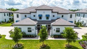 Introducing Nerano, a new coach home neighborhood by Front Door Communities located within the award-winning Miromar Lakes Beach & Golf Club. This limited collection features 10 buildings with four residences each. With 3 homes available for occupancy by March 2026. And 4 Homes ready by November 2026 This designer-coach home offers a private entrance, open-concept great room, volume ceilings, and a gourmet kitchen with large island. The floor plan includes 3 bedrooms and 3.5 bathrooms, a screened lanai with serene lake and preserve views, and an attached 2-car side-entry garage. Buyers may select from ground-floor or top-floor configurations Top floor offers a private den and choose from available customization options. Furniture package available at additional cost. Residents of Miromar Lakes enjoy access to a 700-acre freshwater lake, 3 miles of white-sand beach, a 10,000 sq. ft. zero-edge infinity pool, three onsite restaurants, European spa and salon, fitness center, tennis, pickleball, bocce, racquetball, and the Arthur Hills Signature Championship Golf Course. Concierge services and an extensive lifestyle program complete this exceptional community. NOTE* The video/virtual tour provided represents a fully furnished model unit of the same floor plan. The actual available unit is sold unfurnished and may vary slightly in orientation, view, lighting, or specific finishes. Please contact the listing agent for exact details.