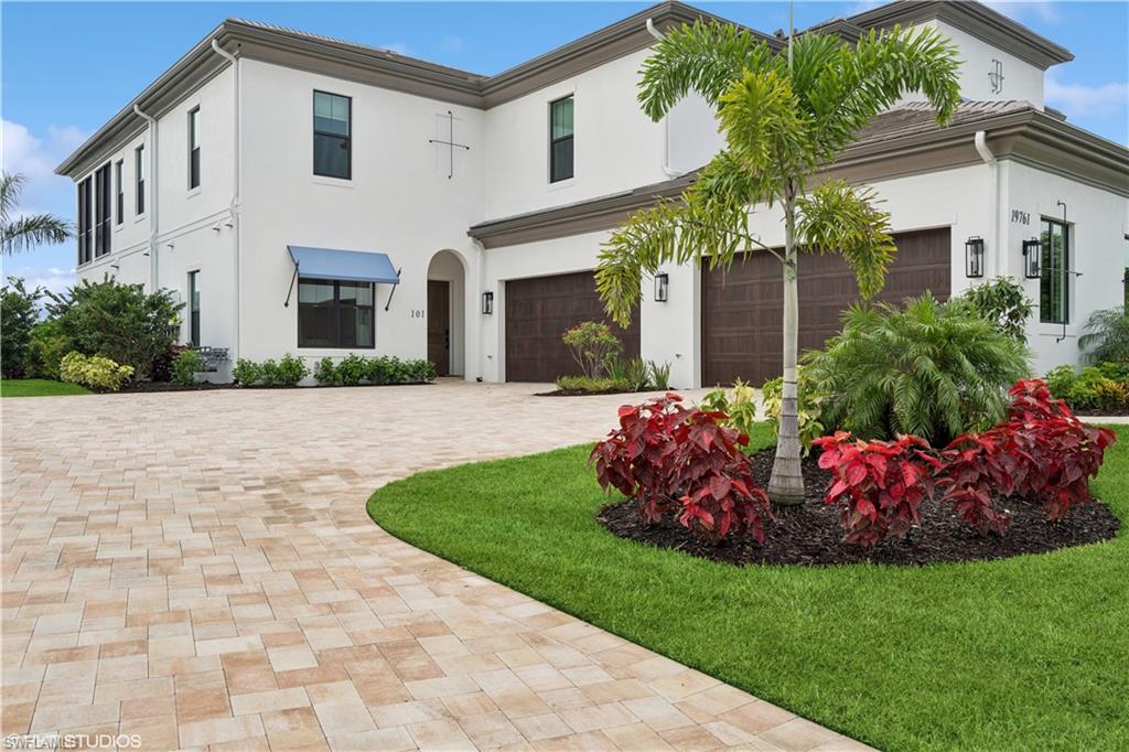 Introducing Nerano, a new coach home neighborhood by Front Door Communities located within the award-winning Miromar Lakes Beach & Golf Club. This unit is desirable ground floor unit complete with model home upgrades throughout. This limited collection at Nerano features 10 buildings with four residences each. Several homes ready for immediate occupancy or make your plans for delivery for later in 2026 or early 2027. 
This designer-coach home offers a private entrance, open-concept great room, volume ceilings, and a gourmet kitchen with large island. The floor plan includes 3 bedrooms and 3.5 bathrooms, a screened lanai with serene lake and preserve views, and an attached 2-car side-entry garage. Buyers may select from ground-floor or top-floor configurations Top floor offers a private den and choose from available customization options. Furniture package available at additional cost.
Residents of Miromar Lakes enjoy access to a 700-acre freshwater lake, 3 miles of white-sand beach, a 10,000 sq. ft. zero-edge infinity pool, three onsite restaurants, European spa and salon, fitness center, tennis, pickleball, bocce, racquetball, and the Arthur Hills Signature Championship Golf Course. Concierge services and an extensive lifestyle program complete this exceptional community.
