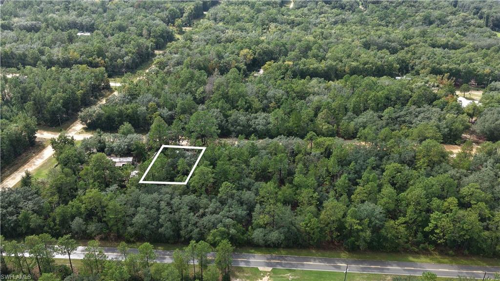 Excellent 0.22-acre residential land opportunity at 604 Del Monaco Ave in Interlachen, Putnam County, offering approximately 9,583 square feet of land with several existing improvements that add functionality and established features to the property. Approximately 80% of the lot has been cleared, and the property is fenced, with an established mailing address and a temporary power pole already in place (not connected).

The property features a 12' x 18' lofted barn shed with insulation, electrical wiring, water piping, air conditioning, and an on-demand hot water heater.

Additional site improvements include a water tank on the premises that was recently filled, an established garden with a dedicated workspace, a compost pile, and a 100-gallon rain barrel. The property also features a built-in fire pit and BBQ area, providing designated outdoor spaces for recreation and practical use.

Located within Interlachen Lakes Estates, Unit 16 Frederick Town, the property offers convenient access to outdoor recreation, nearby lakes, and local amenities. Lake Grandin and Lake Ida are just minutes away, offering opportunities for fishing, boating, and other water activities, with docks and boat ramps in the surrounding area. Lake Grandin is also within biking distance, making it an appealing destination for outdoor enthusiasts. The property's location provides access to St. Augustine, Gainesville, and Ocala, offering a balance of peaceful surroundings and connections to some of North Central Florida's established cities.

The property is zoned R-2. Buyers should confirm permitted uses, minimum lot requirements, setbacks, building requirements, lot coverage, utility availability, legal access, and all applicable development standards before purchasing. The existing shed and other improvements should be evaluated for their condition, intended use, compliance with local regulations, and suitability for any future development plans.

The property is located in Flood Zone X, which is generally considered an area of minimal flood hazard under current FEMA flood maps. Buyers should independently verify the current designation and applicable requirements.

The property is identified by Parcel ID 24-09-24-4075-0530-0110. Subleasing is not permitted. This lot is not available for rent or lease.