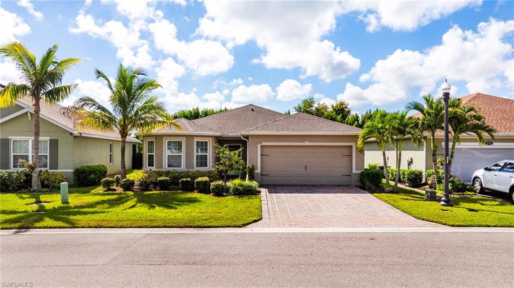 Discover the Florida Lifestyle You’ve Been Dreaming Of in Magnolia Landing, a gated community where resort-style amenities, engaging activities, and friendly neighbors that create the perfect setting for the Florida lifestyle. Rarely available, this charming Easton model offers exceptional curb appeal, a welcoming bay-front window, and a truly move-in-ready interior! Sunshine fills the spacious eat-in kitchen, featuring high-end appliances, granite countertops, and a stylish tile backsplash. The open living and dining areas flow effortlessly, creating an inviting space for everyday living and entertaining. The pass-through window adds a thoughtful touch, keeping everyone connected whether you’re hosting friends or enjoying a quiet evening at home. The spacious primary suite offers a relaxing retreat with plenty of room to unwind and an oversized walk-in closet ready to accommodate everything from beachwear to your favorite evening-out wardrobe. The en-suite bath adds everyday comfort and convenience. Thoughtful extras make settling in easy, including freshly refreshed interior paint, ceiling fans and window treatments throughout, and an epoxy-finished garage floor. Step outside to your private, screened lanai—the perfect place to enjoy morning coffee, sunset cocktails, or dinner under the Florida sky. Beyond your front door, Magnolia Landing offers an exceptional array of amenities, including a resort-style pool, lap pool, fitness center, numerous pickleball courts, bocce, and a variety of social activities. Beautifully maintained grounds and a guard-attended gated entrance add to the appeal of this welcoming community. Even better, Magnolia Landing is pet-friendly, NOT in a flood zone, and offers LOW HOA fees that include community amenities, cable, lawn care, and landscaping maintenance. Whether you’re searching for a full-time residence or the perfect seasonal escape, this delightful home makes it easy to embrace the Southwest Florida lifestyle. Move-in ready, beautifully maintained, and located in a community designed for enjoying life—this Magnolia Landing gem is one you won’t want to miss. Schedule your private showing today!