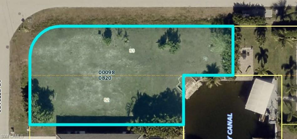 DIRECT RIVER ACCESS IN CAPE CORAL! Rare opportunity to build your dream waterfront home on this prime corner lot at 4901 Seville Court. Featuring a corner seawall, concrete dock, and direct boating access, this property offers one of the biggest advantages for boaters: quick and easy access to the Caloosahatchee River. From your dock, you’re just minutes from the river, putting you on the open water quickly and giving you easy access to the Gulf of Mexico, barrier islands, and some of Southwest Florida’s best boating and fishing.

Beyond the exceptional boating location, you’ll also be close to the growing Bimini Basin area, new waterfront dining, and the many restaurants, shops, and entertainment options throughout downtown Cape Coral. Whether you’re looking to build a full-time residence, vacation home, or investment property, this is an outstanding waterfront location where location, boating access, and lifestyle come together.