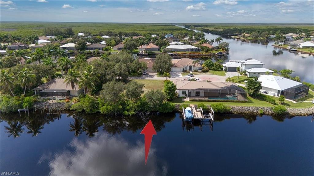 Rare opportunity to own one of the few remaining vacant lots in the desirable Port of the Islands community! This oversized waterfront lot is one of the largest available, boasting approximately 110 feet of waterfront along a wide, deep-water canal with direct Gulf access.

Build your dream home and enjoy the Southwest Florida boating lifestyle right from your backyard. The property is just a short distance from the Port of the Islands Marina, offering a ship store and fuel for added convenience.

Ideally located between Naples and Everglades City, Port of the Islands offers a peaceful waterfront setting while still providing convenient access to shopping, dining, fishing, boating, and the beautiful Ten Thousand Islands. The new Publix shopping center is also just a short drive away.

Large lot, exceptional water frontage, deep-water access, and direct access to the Gulf—an increasingly rare opportunity in Port of the Islands!