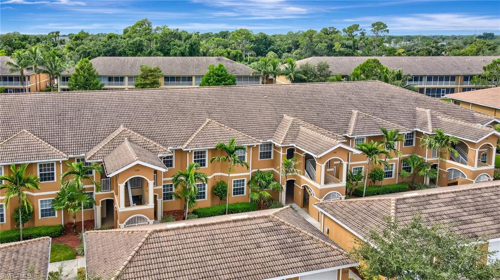 PRICE REDUCED!..."Live Like you are on Vacation" Gorgeous Home has Incredible Waterfront Views with beautiful wildlife to enjoy from almost every room in the Gated-Resort Community of Casa Di Fiori. This Tastefully Furnished-maintenance free home has an extraordinary great room with Vaulted ceilings, crown molding, large tile and double sliders leading to the screened lanai with peaceful views of the Fountain spraying in the lake. Chefs’ kitchen boasts Custom 42-inch wood cabinets, granite counters, Breakfast Island, stainless steel appliances a separate large pantry and volume ceilings. Spacious dining room has designer lighting. The king-sized primary suite includes a large walk-in closet, and sliders to the lanai with lake views. Primary bath has a beautiful glass walk-in shower and dual sink vanity with granite counters. Separate guest area accommodates 2 bedrooms and a bath allowing privacy. Fantastic open floor plan, perfect for entertaining. The entire home has high Wind Impact windows and Storm Smart roll-down screen for energy efficiency and peace of mind. Freshly painted with neutral trending colors, extensive crown molding, window treatments, large tile on the diagonal throughout with new carpet in 2 bedrooms. Inside laundry has ample storage. Detached one car garage with sealed brick paver driveway for additional parking. AC has a transferable warranty. Amazing Amenity Campus has state-of-the-art clubhouse with a full kitchen, card room, TV’s-internet-library, and well-appointed fitness center. The Resort style swimming pool, lap pool is perfect for water aerobics. Play tennis, pickle ball or bocce ball and attend social events for entertainment! Perfect location close to Sam’s Club and BJ's for shopping and many restaurants. Short drive to beautiful Gulf coast beaches. Call today for your private appointment to view this exceptional home!