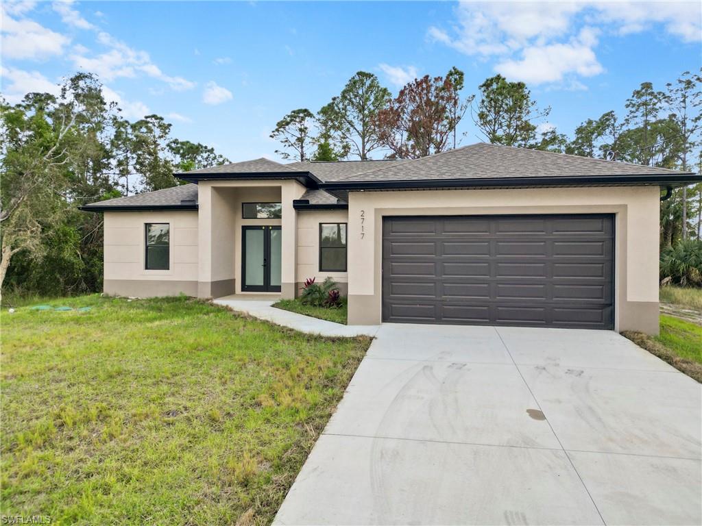 Brand new construction in a prime Lehigh Acres location near Lee Blvd! This 3 bed + den home features an open-concept layout with impressive double-height ceilings, porcelain flooring throughout, quartz countertops, and modern finishes. Built with impact windows and doors for peace of mind. Conveniently located near shopping, dining, schools, and major roads for easy commuting. A must-see new construction opportunity!