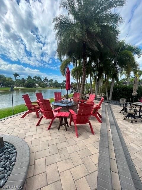 Lot 142 Spectacular Waterfront Luxury at RiverBend Motorcoach Resort. Perfectly positioned on the water, Lot 142 is a showpiece of elegance, comfort, and exceptional outdoor living. From the moment you arrive, the stunning curb appeal, lush tropical landscaping, and thoughtfully designed pavered grounds create an unforgettable first impression. Designed for the discerning luxury motorcoach owner, the coach house is filled with upscale finishes and custom details throughout. The kitchen features striking waterfall-edge countertops, abundant custom cabinetry with crown molding, under-cabinet lighting, premium appliances, and a large island offering both exceptional storage and gathering space. A charming loft with library-style ladder access provides additional storage or accommodations for occasional guests, while the built-in office area creates the perfect workspace or hobby nook. The beautifully appointed bathroom showcases a luxurious tiled shower complete with multiple shower heads and ample storage. Natural light floods the living area through expansive sliding glass doors and a dramatic gable windows, creating a bright and welcoming atmosphere that seamlessly connects indoor and outdoor living. Step outside to an extraordinary outdoor kitchen designed for effortless entertaining. Whether hosting friends or enjoying a quiet evening, this outdoor space delivers the ultimate Florida lifestyle. The elevated lanai overlooks the water and leads to inviting gathering areas where you can soak in the sunshine, watch native wildlife, and enjoy RiverBend's breathtaking sunset skies. As evening falls, the firepit becomes the perfect centerpiece for relaxation, conversation, and waterfront enjoyment. The property's low-maintenance landscaping combines decorative stone accents, finished pavers, and mature tropical plantings, including majestic palms and vibrant foxtails along the waterfront, creating a lush private retreat with minimal upkeep.
Life at RiverBend is more than ownership, it's an experience. This exclusive luxury motorcoach resort offers a rare blend of natural beauty, refined amenities, and a vibrant social atmosphere. Enjoy pickleball matches, poolside afternoons, sunset gatherings, bocce under the palms, golf cart cruises, dining events, bourbon and cigar socials, tap room trivia, music events and countless opportunities to connect with neighbors in an atmosphere of relaxed sophistication. Opportunities to own a premier waterfront property of this caliber are exceptionally rare. Lot 142 offers luxury, lifestyle, and unforgettable views in one remarkable package.