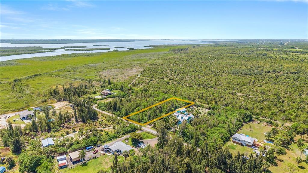 ATTENTION ALL VACANT LOT BUYERS!!!  This is the least expensive one acre vacant lot on Pine Island zoned Ag-2!  Don't let this sweet deal get away from you!   This vacant lot is close to marinas, restaurants, groceries, and within minutes from any of the Pine Island boat ramps, and you can be in the Gulf of Mexico within minutes, without locks or bridges!  Build your dream home without HOA restrictions.  Plenty of room to build a barn for your RV, storage, etc. and a pool.  There are many nice homes in the area.  Pine Island Water is available, so you do not need to drill a well.  Don't less this opportunity slip past you.