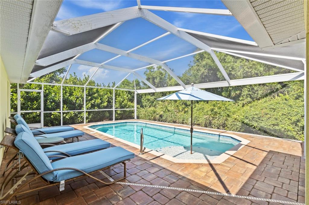 Beautifully maintained three bedroom, two bath home located in the charming town of Bokeelia, Florida. This property offers the perfect blend of coastal character and modern comfort, ideal for full-time living or a vacation retreat. Enjoy convenient access to fishing and boating, with the ability to be out on the water in just minutes. The home is situated on a spacious half-acre lot featuring mature mango and Meyer lemon trees, creating a private and tropical setting. Relax on the screened lanai overlooking a peaceful mangrove backdrop, perfectly positioned with southern exposure to take in stunning sunset views. The home also features a heated pool with solar panels for energy-efficient enjoyment year-round. Additional highlights include a two-car garage and brand new appliances, with the washer and dryer conveniently located in the garage. This is a rare opportunity to own a slice of paradise with privacy, natural beauty, and easy access to the water. Located on the northern end of Pine Island, this area is known for its laid-back coastal lifestyle, world-class fishing, and unspoiled natural surroundings. Residents enjoy easy access to the Gulf, along with nearby marinas, restaurants, and nature preserves. With its relaxed atmosphere and natural beauty, it offers a peaceful escape from the hustle while still being within reach of everyday conveniences.