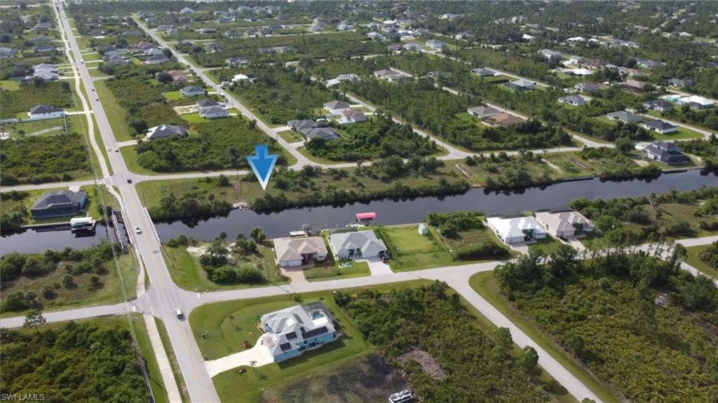 Discover your perfect waterfront homesite in the heart of South Gulf Cove! Featuring 80 feet of water frontage and a unique community lock system that allows boaters to navigate from the freshwater canals out to Charlotte Harbor and into the Gulf of America with ease, this prime lot offers the ideal setting to build your dream coastal retreat. South Gulf Cove is a boater’s paradise with miles of navigable canals, parks, playgrounds, and sidewalks all within a relaxed, friendly community. Just minutes from the pristine beaches of Boca Grande and Manasota Key, enjoy nearby golf, dining, and shopping. With public water and sewer available as well as no zoning restrictions for "Scrub-Jays". Start living the Florida lifestyle you’ve always imagined in this hidden gem of Port Charlotte.