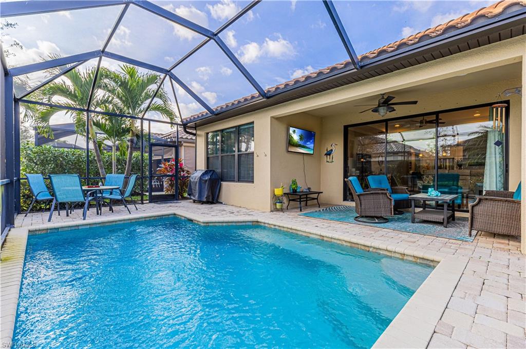 BEST VALUE IN ESPLANADE AT HACIENDA LAKES. Unlike new construction, this 3-bedroom plus den home offers more upgrades and a private pool, all move-in ready with no waiting! Designed for easy Florida living, this home features an open, light-filled floor plan with 10-foot ceilings, luxury finishes and a gourmet kitchen. Upgrades include Pompeii Quartz countertops, gas stove, newer stainless steel appliances, and a built-in microwave drawer. The spacious dining area is perfect for entertaining or every day comfort. The flexible den adds valuable space for a home office or guests. Step outside to your private screened pool and lanai, ideal for enjoying Naples’ sunshine year-round. The spacious owner’s suite includes a large walk-in closet and an updated bath with walk-in shower and dual sinks. The split-bedroom layout provides privacy with two additional guest bedrooms and a full bath.  Esplanade at Hacienda Residents enjoy access to a 6,500 sq ft clubhouse featuring a 24/7 fitness center, resistance and lap pools, yoga studio, pickleball, tennis, bocce, playground, and dog parks, along with an active social calendar. Located just minutes from the pristine beaches of Naples and Marco Island and the charm of Naples 5th Avenue. This home also benefits from very low HOA fees * only $390/month* New HVAC and pool pump. Home is situated on the hospital grid for added security.