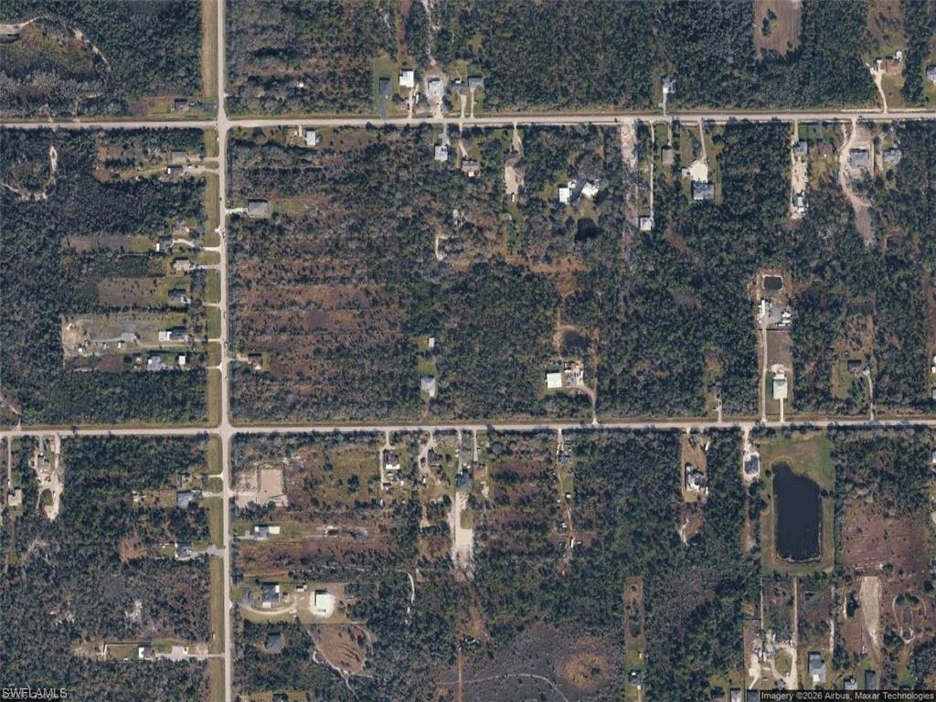 Excellent opportunity to own a vacant lot at 3275 70th Ave NE in Naples. The property features uplands and impact fee credits, offering potential savings for buyers planning to build. Conveniently located in Golden Gate Estates, this property provides an opportunity to create your ideal home in a growing area of Southwest Florida. Buyer to conduct their own due diligence regarding upland verification, impact fee credits, zoning, permits, utilities, and building requirements.