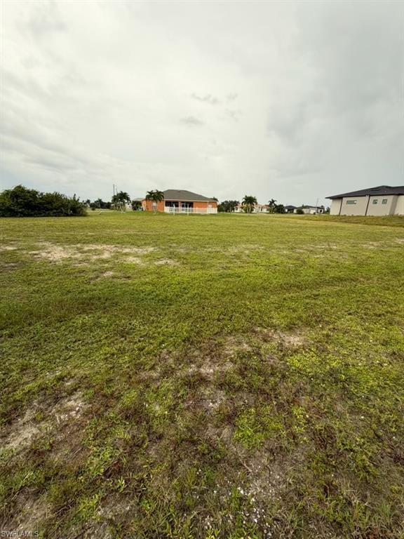 Oversized Triple Lot with Southern Exposure in NW Cape Coral! Build your Florida dream home on this spacious 0.34-acre homesite offering 14,810 square feet and desirable southern exposure. The extra space opens up possibilities for a custom home, expansive outdoor living, a pool, or simply more yard to enjoy. Located at 4326 NW 32nd Street, this property is an ideal opportunity for buyers and builders seeking room to bring their vision to life. Whether you’re planning your forever home or a Southwest Florida retreat, this triple lot offers space to create something special.