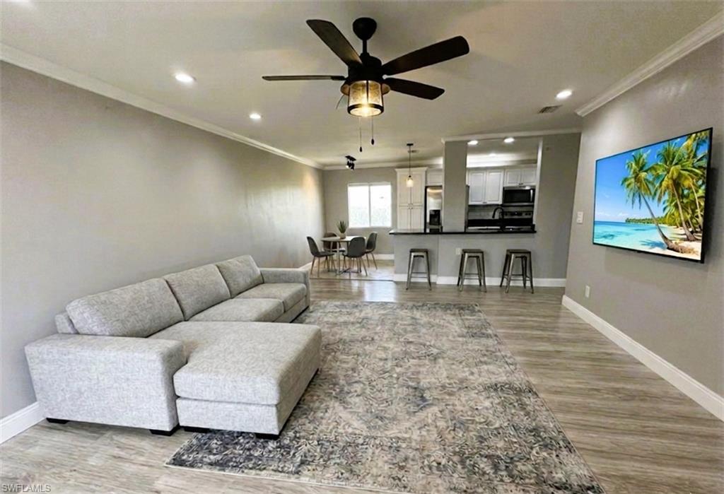 One or more photo(s) has been virtually staged, AI generated or rendered.  

Back on the market due to buyer cancellation! Appraised at $116,700. Priced for immediate short sale submission. All new offers are still subject to final lender approval

Experience elevated living in this stunning 5th-floor condo, where 1,092 square feet of open-concept design meets sweeping panoramic views. This maintained 2-bedroom, 2-bathroom residence offers a seamless blend of style and comfort, featuring crown molding, durable laminate flooring, and a newer HVAC system for year-round peace of mind. The kitchen serves as the heart of the home, fully equipped with granite countertops, a classic subway tile backsplash, stainless steel appliances, and a built-in water filtration system.

Step through the spacious living area to your private, screened-in lanai...the perfect vantage point to enjoy the Florida breeze and incredible elevated views. For added convenience, this unit includes a designated carport parking spot and access to on-site community laundry facilities, while the community itself boasts a resort-style pool and lush tropical surroundings. Perfectly situated for the active lifestyle, you are close to I-75, providing quick access to the area’s best shopping, dining, and restaurants. Whether you are seeking a full-time residence or a seasonal retreat, this move-in-ready condo offers the modern upgrades and prime location you’ve been searching for. Schedule your private showing today!