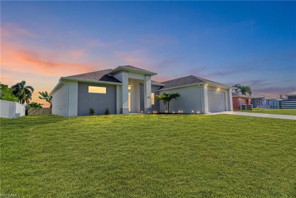 Discover exceptional value in this impeccably maintained, 2021-built home located in the highly desirable NW Cape Coral! Offering 3 spacious bedrooms, 3 FULL bathrooms, 1,971 sq. ft. of living space, and a 2-car garage, this stunning residence combines modern luxury, thoughtful design, and everyday functionality.
From the moment you step inside, you'll appreciate the soaring ceilings, abundant natural light, and gorgeous porcelain tile flooring throughout. The spacious open-concept floor plan creates an inviting atmosphere, perfect for both entertaining and comfortable everyday living. The beautifully appointed gourmet kitchen is the heart of the home, featuring 42-inch cabinetry, elegant quartz countertops with a waterfall edge, stainless steel appliances, and an expansive breakfast bar offering plenty of seating. The kitchen flows seamlessly into the generous living and dining areas, creating an ideal space for gathering with family and friends.

One of the home's standout features is the stunning ZERO-CORNER SLIDING GLASS DOORS, allowing you to effortlessly blend indoor and outdoor living while enjoying Southwest Florida's beautiful year-round weather.

Additional highlights include HURRICANE-IMPACT WINDOWS AND DOORS THROUGHOUT, CITY WATER AND SEWER, contemporary finishes, and a thoughtfully designed layout with three full bathrooms for added convenience.

LOCATION, LOCATION, LOCATION! Situated in the rapidly growing Northwest Cape Coral area, this home offers convenient access to Publix, shopping, restaurants, Pine Island Road, and nearby public boat ramps. Enjoy a short drive to charming Matlacha, known for its waterfront dining, fishing, art galleries, and laid-back island atmosphere.
 An assumable flood insurance policy adds additional potential value for the next owner.
Whether you're searching for a full-time residence, seasonal Florida retreat, or investment opportunity, this beautifully maintained, move-in-ready home delivers the perfect combination of style, location, and value.