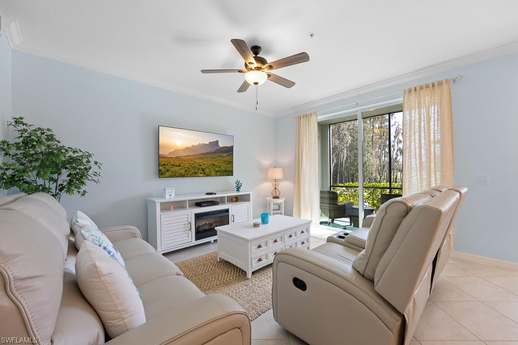 Welcome to an exceptional opportunity in The National Golf & Country Club at Ave Maria—now vacant and ready for immediate enjoyment or investment just in time for the 2026 season. This highly sought-after first-floor Birkdale model is being offered fully turnkey and move-in ready, ideal for seasonal use, rental income, or full-time living. This well-maintained condo offers 2 bedrooms, 2 bathrooms, and 1,154 sq. ft. of open-concept living and showcases the coveted trifecta of views—golf course, water, and preserve—creating a rare and serene backdrop. The kitchen features a large island, stainless steel appliances, pantry, and upgraded tile backsplash, flowing seamlessly into the living and dining areas. The screened lanai is the perfect place to relax and enjoy peaceful sunsets and scenic views. Upgrades throughout include crown molding, fresh designer paint, tasteful accent walls, and tile flooring throughout—no carpet. The owner’s suite offers a walk-in closet and an en-suite bath with a glass-enclosed shower, while the guest bedroom and full bath provide privacy and comfort for visitors. Additional features include impact-resistant windows and doors, a full laundry room, covered carport, and ample guest parking. The unit is conveniently located near a satellite pool for easy access. This condo includes a private bundled golf membership, providing unlimited access to the championship 18-hole course and world-class resort amenities, including resort and lap pools, fitness center with classes, full-service spa, pickleball, tennis, bocce, dining, and more. HOA fees cover cable, internet, water, trash, exterior maintenance, pest control, and 24-hour security for worry-free ownership. Turnkey. Vacant. Upgraded. Bundled with golf. Featuring rare views and a prime location, this Birkdale condo is ready to be yours for the 2026 season and beyond.