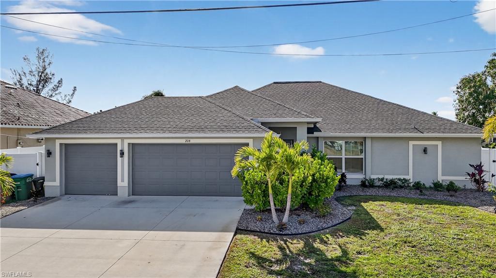 FABULOUS, BOATING-FISHING "THE FLORIDA LIFE" WITH THIS NEWER WATERFRONT CONSTRUCTION WITH BUILDER/OWNER UPGRADES ($100,000+/-)  4 BEDROOM, 2 BATH, 3 CAR GARAGE, POOL-SPA HOME is located in one of Southwest Cape Coral’s most desirable neighborhoods, offering SOUTHERN EXPOSURE, a peaceful FRESHWATER CANAL setting, and a quiet street perfect for everyday living or a seasonal retreat. Situated on CITY WATER, SEWER, AND IRRIGATION. BIG "OPEN FLOOR PLAN" WITH 10' CEILINGS, ALL CUSTOM  "WOOD PLANK" VINYL TILE FLOORING FOR COMPLETE EASE AND MAINTENANCE. this home features VAULTED CEILINGS, CUSTOM WINDOW SHADES, TILE FLOORING in the main living areas, and LUXURY VINYL PLANK flooring in the bedrooms. The SPLIT-BEDROOM FLOOR PLAN provides comfort and privacy, with the guest bathroom doubling as a CONVENIENT POOL BATH. "CHEFS" KITCHEN WITH LEVEL 5 GRANITE COUNTERTOPS, RAISED PANEL WOOD CABINETRY, HIGH END STAINLESS STEEL APPLIANCES, and a CENTER ISLAND WITH BAR SEATING—PERFECT FOR FAMILY GATHERING AND ENTERTAINING. MASTER BED ROOM HAS VAULTED CEILING, HIS & HERS CLOSET, DUAL GRANITE VANITIES, FLOOR-TO-CEILING ALL TILE & GLASS WALK-IN SHOWER. OUTSIDE, PRIVATE SCREENED LANAI featuring a BRAND-NEW HEATED SALTWATER POOL with SPILLOVER SPA, SWIM-UP BAR SEATING, SUNDECK and MOSAIC TILE ACCENTS, (YOUR GUESTS & KIDS WILL NEVER WANT TO LEAVE THE POOL). The FULLY FENCED BACKYARD offers added privacy, while the SEAWALL WITH LADDER ACCESS makes it easy to LAUNCH A KAYAK or GREAT BOATING AND FISHING, EVEN RIGHT FROM YOUR BACK YARD. Additional highlights include AMPLE CLOSET SPACE, GRANITE RECTANGULAR SINKS IN BATHROOMS, and ELEGANT GLASS TILE ACCENTS throughout. Whether used as a PRIMARY RESIDENCE, VACATION GETAWAY, or INVESTMENT PROPERTY (SUPER VACATION RENTAL INCOME OPPORTUNITIES WHEN NOT USED). Home is close to TOP-RATED SCHOOLS, CHURCHES, HOSPITALS, SHOPPING, RESTAURANTS, ENTERTAINMENT, and SOUTHWEST FLORIDA’S BEAUTIFUL BEACHES. Home comes with a ONE-YEAR HOME WARRANTY, for total buyer comfort!