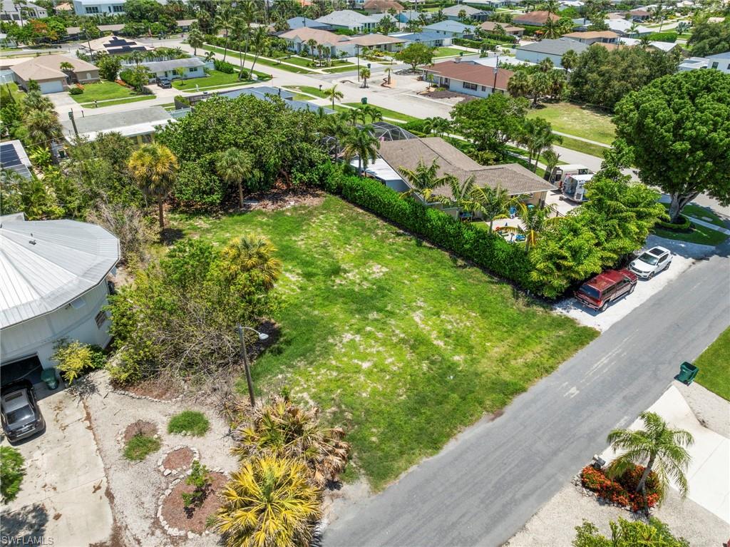 Rare and Affordable opportunity to own one of the few remaining uncultivated home sites on the north side of Marco Island. This generous 8,712 sq ft (0.20 acre) parcel, situated on a peaceful cul-de-sac, offers a perfect canvas to design and build your dream residence in one of Southwest Florida’s most coveted coastal communities. Located just minutes from the celebrated white sands of Residents’ Beach, local shops, dining, and everyday conveniences, this exceptional homesite blends tranquility with prime island living. Enjoy easy access to boating, world-class fishing, golf, and the vibrant lifestyle that defines Marco Island.  Don’t miss this rare chance to build your custom home in a well-established, non-gated neighborhood.