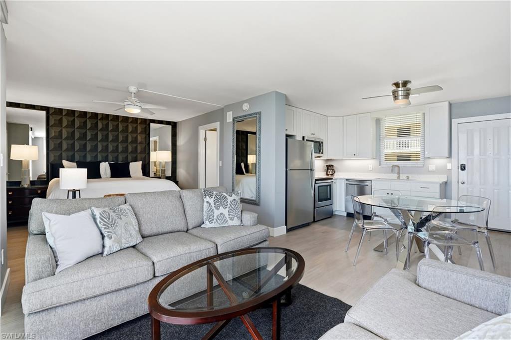 Tastefully remodeled and fully furnished 8th floor unit! This efficiency condo is conveniently located across from Bonita Beach and Doc's Beach House and offers many amenities including two community pools, tennis courts, pickleball, bicycle storage, and more. This unit also comes with its own all in one washer/dryer, new water heater, brand new stainless steel appliances, beautiful quartz countertops, newly installed under cabinet lighting, and premium McMillan "white oak" laminate flooring throughout. This is the ultimate beach getaway with gorgeous Southern Gulf views. Great potential as a future investment with relaxed rental restrictions allowing owners to rent 121 times a year for a minimum of 3 days! The white sandy beach awaits, bring your flip flops!