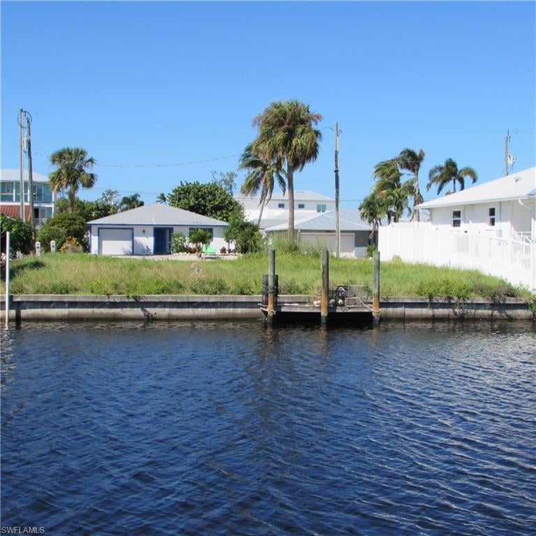 WATERFRONT SINGLE FAMILY LOT ... North end of Pine Island.. Direct Saltwater access to Charlotte Harbor... Seawall and small Wood Dock... Lot is cleared and ready for your new Island Home and is located on the East side of Buccaneer St, which means wider and deeper canal !!!! Great location close to 2-Marinas for gas and boating/fishing equipment. Check out the Out Islands, only acceptable by boat, Cabbage Key, Useppa Island and Boca Grande for Great Lunches and the best fishing in Florida... Take a look at this lot today !!