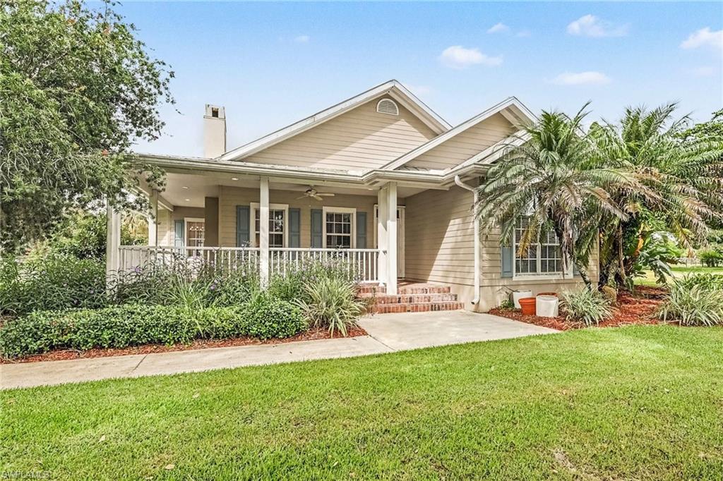 Fantastic 3 bedroom 2 bath 4 car garage gulf access home with air conditioned out building on just over 3.5 acres!! This property boasting more than 2000sf of living area has a beautiful kitchen with stainless steel appliances, large living area with fireplace, spacious master bedroom and bath, generous sized guest rooms, loads of outdoor living space on the multiple screened porches!! So many extras including, metal roof, lush landscaping, NOT IN A FLOOD ZONE, property is totally fenced, private gated community with only 4 properties behind the gate, BOAT DOCK AND LIFT on the Caloosahatchee river and so much more!!