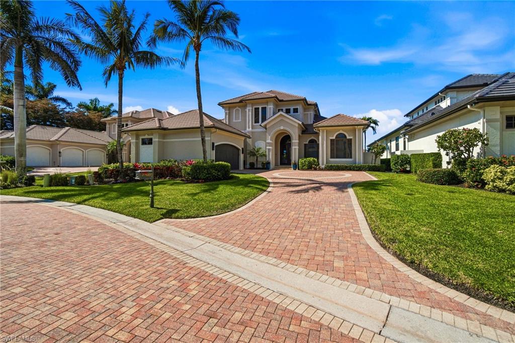 NEWLY RENOVATED, AND BEAUTIFULLY APPOINTED CONTEMPORARY, WATERFRONT ESTATE IN A PRIVATE GATED PENINSULA WITH DESIGNER-GRADE FINISHES THROUGHOUT! IDEAL FOR BEACH LOVERS & BOATING ENTHUSIASTS! ONLY A 5-MINUTE DRIVE TO BAREFOOT BEACH & BONITA BEACH PLUS EASY BOATING GULF-ACCESS! Includes 2 BOAT DOCKS: one a zero-maintenance Tandek boat dock with a 10,000 LB BOAT LIFT (new boatlift motors in 2023) plus a FIXED DRY DOCK for an additional boat or Jet-Ski! HIGH & DRY DURING HURRICANE HELENE & MILTON WITH NO WATER INTRUSION! Nestled on a WIDE CANAL just off the IMPERIAL RIVER with magnificent WATER VIEWS & COVETED WEST EXPOSURE FOR BREATHTAKING SUNSETS over the water as boats sail by. Built like a fortress, this home offers 4,437 sq ft under air, all CONCRETE CONSTRUCTION, NEW ROOF in 2023, HURRICANE IMPACT WINDOWS/SLIDERS AND 3 NEW A/C UNITS. Prepare to be WOWED when you walk in and see the NEW IMPACT SLIDING DOORS (40 feet wide with low-E tint) that open to the RESORT-STYLE OUTDOOR LIVING SPACE with a freshly resurfaced & retiled pool, travertine coping, multi-color LED lights, spa, outdoor kitchen, lounging area with 65 inch TV & dedicated pool bath…all overlooking the spectacular water views through the NEW PANORAMIC HURRICANE GRADE SCREENING AND CAGING. The home features an INCREDIBLE OPEN FLOOR PLAN for both entertaining and family gatherings, with 12 FT CEILINGS on the main level. This exceptional property also has an Elevator, 5 large bedrooms all with en-suite baths, 2 half baths, “hidden office”, two screened-in lanai’s, laundry room with the primary suite and all living spaces on the main level! The 2026 NEWLY RENOVATED CHEF’S KITCHEN is complete with SUB ZERO and WOLF APPLIANCES (GAS RANGE), QUARTZ COUNTERTOPS and full wall backsplash, Serena and Lily wallpaper, CUSTOM SOLID WOOD CABINETRY with an oversized dining island, prep island, walk-in pantry and a nearby temperature-controlled wine room plus a separate 300-bottle dual zone wine Eurocave. The spacious primary suite is the ultimate private oasis with a sitting area, access to the lanai, large walk-in closet with California style built-ins & a brand new renovated spa-like bathroom with dual vanities, modern freestanding tub, large walk-in shower and Newport Brass finishes. The private second floor is perfect for guests! Offers two guest suites with en-suite bathrooms and its own expansive screened-in lanai with magnificent views of the river and beyond. The oversized 2 car garage has a new epoxy floor (2026) and dual storage racks that were installed in 2025. River Reach is a NATURAL GAS COMMUNITY that offers LOW MAINTENANCE LIVING…the HOA fee covers roof replacement (and repairs), house painting (and repairs), lawn care, pool care, mangrove trimming, irrigation system maintenance, interior and exterior pest control! Incredible location near many wonderful local restaurants, a short drive to Coconut Point, Mercato, the Promenade, Waterside Shops, 5th Ave & RSW International Airport.