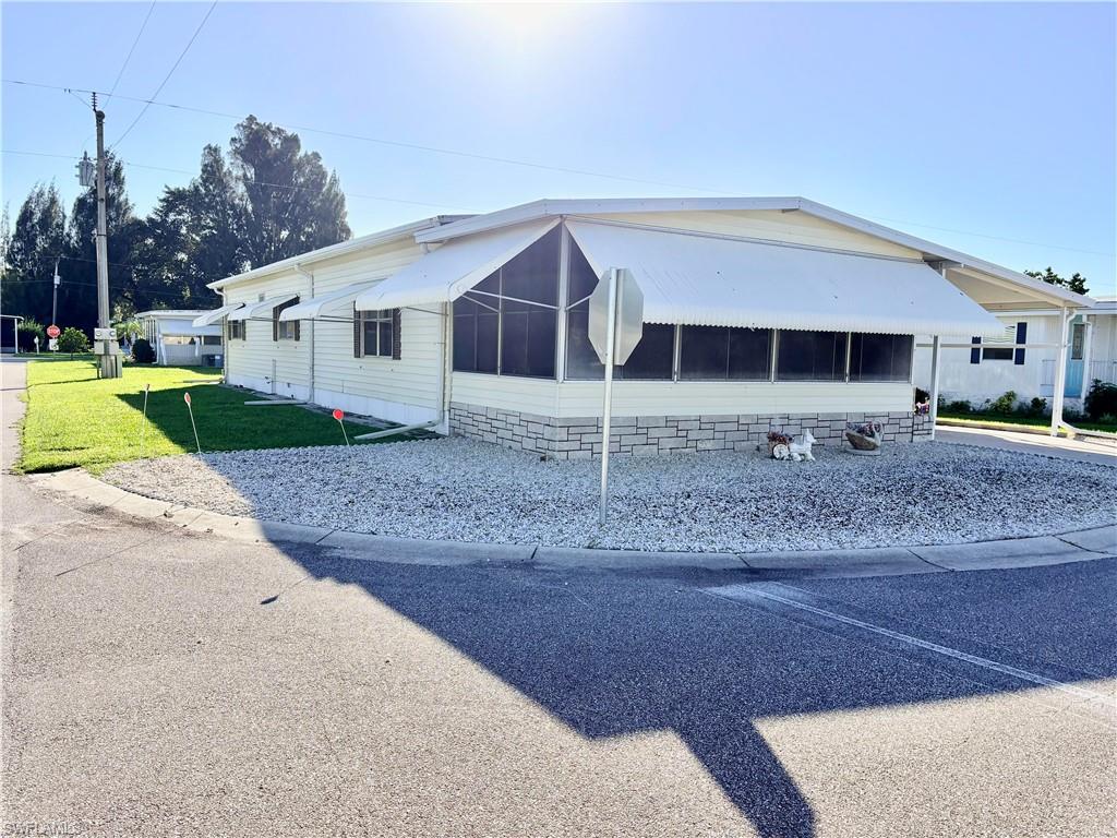 Large 2-bedroom, 2-bath manufactured home offering comfortable and affordable Florida living. This home layout features a spacious living room, dedicated dining area, and an inviting kitchen with bar and plenty of storage. Both bedrooms are generously sized, and the primary suite includes an en-suite bath for added convenience.  Carport is large enough for 2 vehicles and a golf cart.

Please excuse the mess as the owner is packing and preparing to move.

Laurel Estates offers many fun parties, dances, shows and games to participate in or you can just relax by the pool visiting with great neighbors.

Enjoy morning coffee or evening breezes from the screened lanai, with easy access to the attached shed and laundry area. This home is move-in ready and located in a friendly 55+ community close to shopping, dining, medical services, and all the essentials of North Fort Myers.