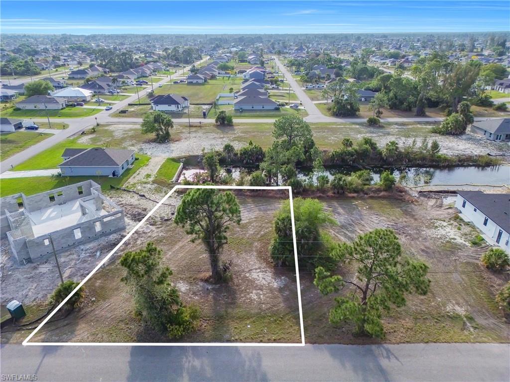 Build your dream home on this desirable vacant residential lot located in Cape Coral!!! Situated on a freshwater canal, this property offers peaceful waterfront views and direct access to Cape Coral’s extensive canal system—perfect for kayaking, fishing, and enjoying the Florida lifestyle. The lot is in a NO FLOOD zone, and there are no HOA restrictions, giving you flexibility in design and use. Conveniently located in Northeast Cape Coral near the Gator Circle area, the property provides easy access to shopping, dining, schools, and major roadways while still maintaining a quiet residential setting. This is an excellent opportunity to own a waterfront homesite in one of Southwest Florida’s fastest-growing communities.