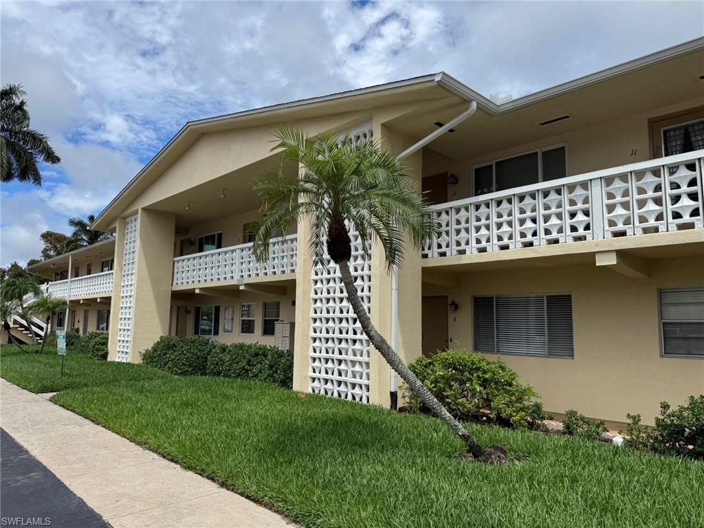 This Home Shines!  What a great home for the price.  Updated kitchen cabinets, brand new appliances and quartz countertops.  Updated bath with walk in shower, marble look tile, and safety grab bars.  This is a first floor unit that has never flooded and the association does not carry flood insurance.  The home is priced accordingly.   There are two nice sized bedrooms, one with a walk in closet.  There is also a large enclosed sunroom off the rear of the home that is heated and cooled and has beautiful tile floors and could be used as a den/study or third sleeping room.  The sunroom also has direct access to the rear of the building. The home is freshly painted and is ready for immediate occupancy just like it is.  The HVAC is new in 2025. The home is located on a quiet non through street.  If you are looking for a quality home, a peaceful setting and at an affordable price, this is it.