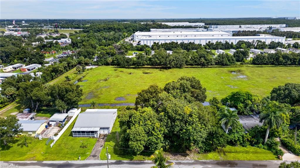 Discover the possibilities at 2566 Dryden Circle in Fort Myers! This vacant residential lot offers an opportunity to create your own slice of Southwest Florida living. Nestled in an established neighborhood, the property features mature trees and lush natural vegetation, providing a beautiful setting for a future home. Surrounded by residential properties and conveniently located near shopping, dining, and everyday essentials, this location offers the appeal of neighborhood living with easy access to the greater Fort Myers area. Whether you're looking to build a personal retreat or invest in vacant land, this property offers a blank canvas to bring your vision to life. Buyers are encouraged to verify zoning, permitted uses, utilities, lot dimensions, and building requirements with Lee County.