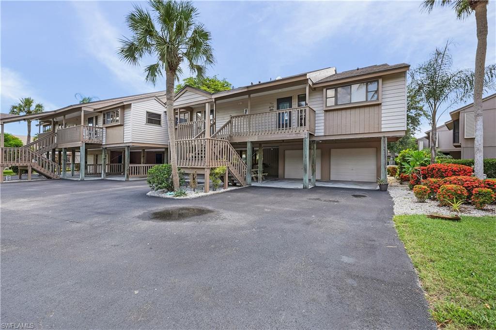 Welcome to this beautifully maintained 2-bedroom, 2-bathroom end-unit condo in the sought-after Captains Harbor community. Sold turnkey furnished, this move-in-ready home is perfect as a full-time residence, seasonal getaway, or investment property.
Step inside to find 18" tile flooring throughout, creating a clean, cohesive, and low-maintenance living space. The beautiful kitchen is a chef's delight, offering plenty of cabinet storage, gorgeous granite countertops, and a convenient breakfast bar — perfect for casual dining or entertaining.
Both bedrooms are generously sized with walk-in closets, and an in-unit laundry room adds everyday convenience. As an end unit, you'll enjoy extra privacy and natural light, along with a quiet, tranquil setting overlooking the community's tennis and pickleball courts.
Boaters will love the included dock with water and electric — just a short boat ride to Charlotte Harbor and the beautiful outer islands. A private two-car garage provides ample storage and parking.
Community amenities include a sparkling pool and scenic walking paths, all just minutes from great restaurants and shopping.
Don't miss this rare opportunity to own a turnkey, boater's-paradise condo in one of the area's most desirable communities!