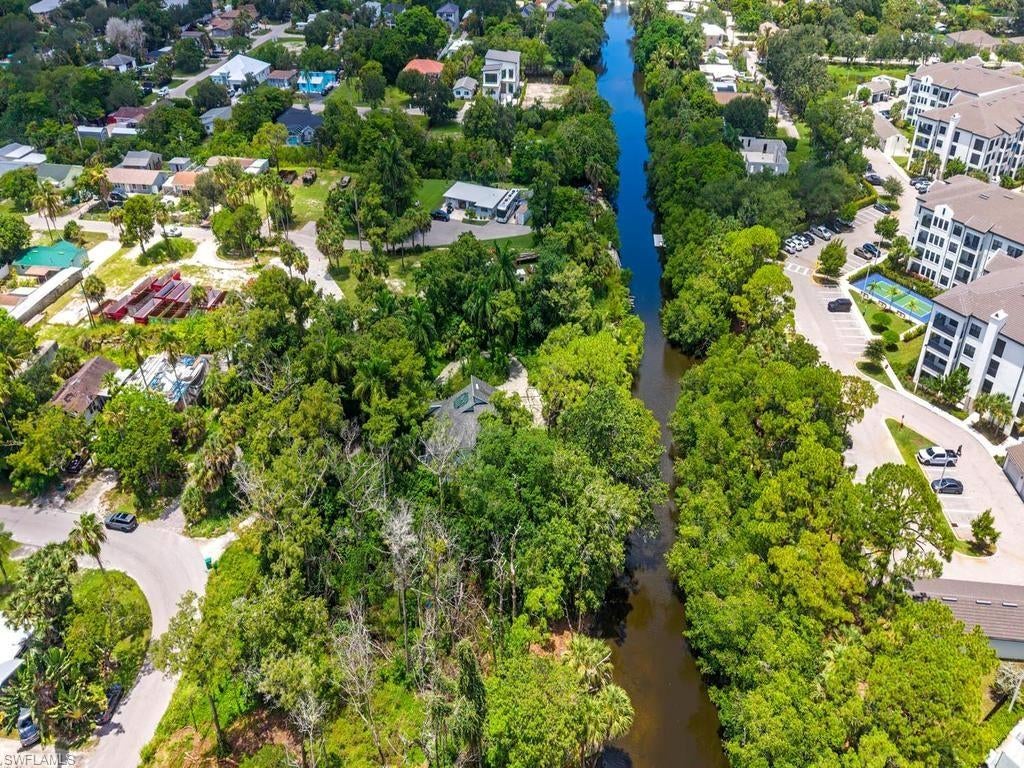 LOT VALUE ONLY!!! Nearly an acre of waterfront opportunity just 2.8 miles from downtown 5th Avenue South with access to the Gulf of Mexico. This is the kind of lot that rarely comes available in this location: room to design and build your dream home from the ground up, or a prime redevelopment play for the savvy investor or builder.

Enjoy boating, fishing, and sunset views right from your backyard, all while staying minutes from Naples’ world-class dining, shopping, and beaches. Whether you’re envisioning a custom estate or a smart investment, this rare combination of space, water access, and proximity to downtown is nearly impossible to replicate at this price point.

Incredible value for waterfront land this close to 5th Ave this won’t last long. Bring your builder and your vision!