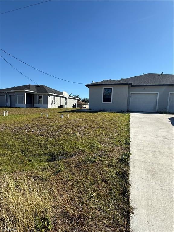 Beautiful duplex, Unit A, 2 bedroom 2 bathroom with a den that could be a third bedroom. Impact windows, stainless steel appliances luxury vinyl plank flooring, granite countertops, tile showers and oversized primary bedroom. Great location for commuter, close to SR82, RSW, shopping and dining. Don't delay, this gem won't last!