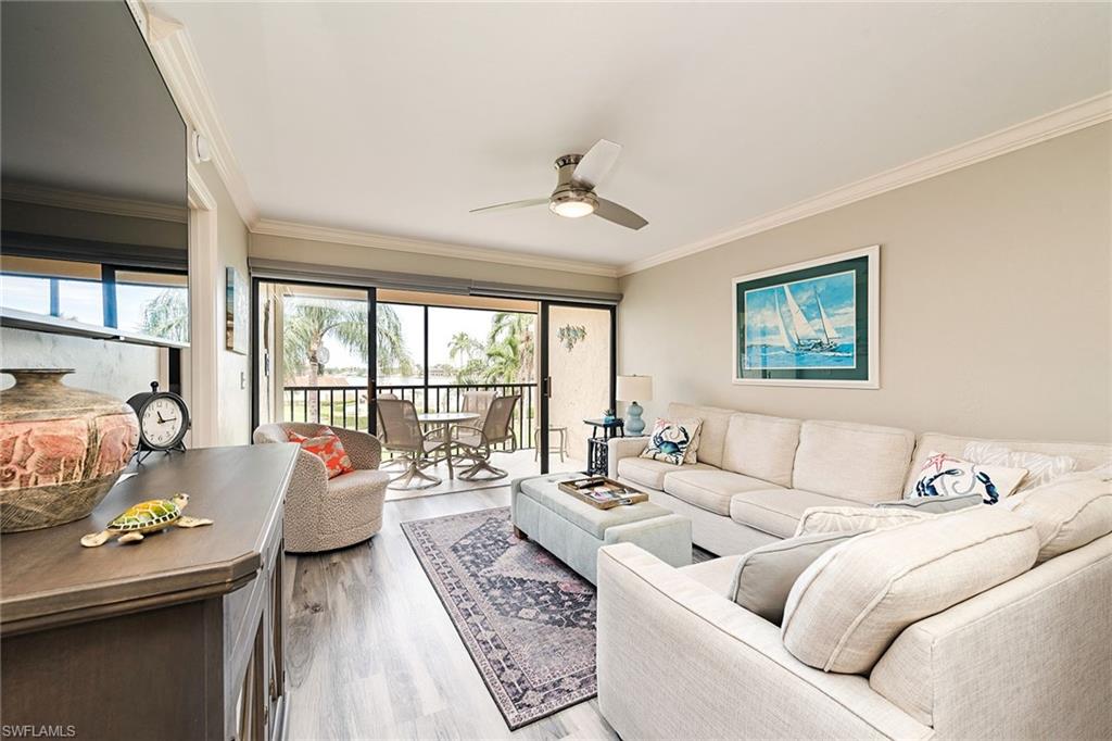 Enjoy scenic Smokehouse Bay views right from the screened lanai of this delightful two bedroom getaway.  Spend lazy days at the bay side pool surrounded by the lush landscaped grounds.  Or bring your boat and tie up at the common boat dock.  You are minutes away from The Esplanade by boat or walking.  The Esplanade features wonderful shopping, gourmet restaurants and the best hot spot in town at CJ's.   It's a short ride to the beautiful beaches, four miles of white sand, shelling, and fabulous sunsets.  

This unit was recently updated with an all new kitchen, new flooring, new blinds and new flat screen TVs.  Within the unit there is a new washer and new dryer.  Included are free Wi-Fi access and cable TV. There is covered parking to keep your car cool and out of the bright sun.  The unit is centrally located near grocery shopping, pharmacies and beach shops that will have everything you need to complete your vacation.

Come and relax in the Florida Sunshine.