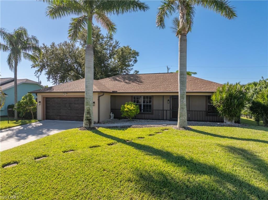 Opportunity Is Right Here, Right Now!  This Well Maintained, 3 Bedroom, 2 Bath, 2 Car Garage Home Is Spotless Clean and Move-In Ready. Watch The Video Of This Beautiful Home Located In A Quiet, Established Neighborhood, With Mature Trees and Landscaping, A Large Fenced Back Yard, And Surrounded By Other Nice Homes.  The Many Features Of This Home  Include: Woodlike Flooring Throughout, Granite Counters & Backsplash In The Kitchen, Hardwood Cabinets With Additional Cabinets Under The Kitchen Island,  An Open Style Kitchen & Great Room, And A Split Bedroom Floorplan.  Enjoy Time In Your Private, Tiled Lanai Or On The Pavered Patio In Your Beautiful Back Yard.  Conveniently Located Near Shopping, Restaurants, Schools, Churches, Parks, And Our Area's Gorgeous White Sand Beaches!   Shedule Your Showing Today For This Great Opportunity.