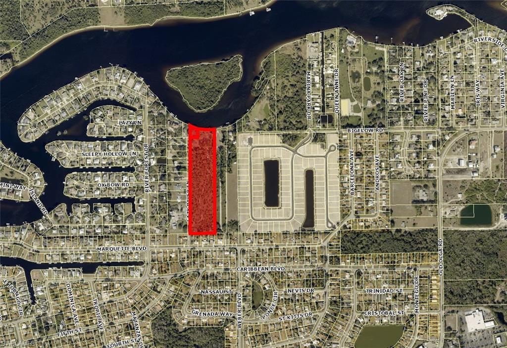 Exceptional 10-acre riverfront opportunity on the Caloosahatchee River in Fort Myers, offering approximately 320 feet of direct waterfront below the Franklin Lock with unrestricted boating access to the Gulf of Mexico. Surrounded by majestic oaks and pines, this rare property combines breathtaking river views, exceptional privacy, and outstanding investment potential. Currently zoned RS-1 Suburban, the property offers the potential to develop up to 60 residential units, subject to county approvals and infrastructure requirements, making it an extraordinary opportunity for developers, investors, and builders seeking to create a premier waterfront community. Plans could include premium riverfront homesites with private dock potential, while additional residences may enjoy river access through a community boat ramp and dock. Central water and sewer are available, further enhancing the property's development appeal. For those seeking a private estate, this remarkable property provides the perfect setting to create a custom riverfront retreat with ample room for barns, garages, workshops, guest houses, and other outbuildings while preserving the natural beauty of the landscape. A private boat ramp may also be added, and the protected waterfront location behind an oxbow island helps shield boats and docks from heavy wave action. A generous 25-foot building setback from the river's edge allows future construction to maximize the spectacular water views and embrace the ultimate Southwest Florida waterfront lifestyle. Parcel 20-43-26-02-00002.0010 is included in the sale. Opportunities of this size, location, flexibility, and development potential are exceptionally rare on one of Southwest Florida's most desirable waterways.