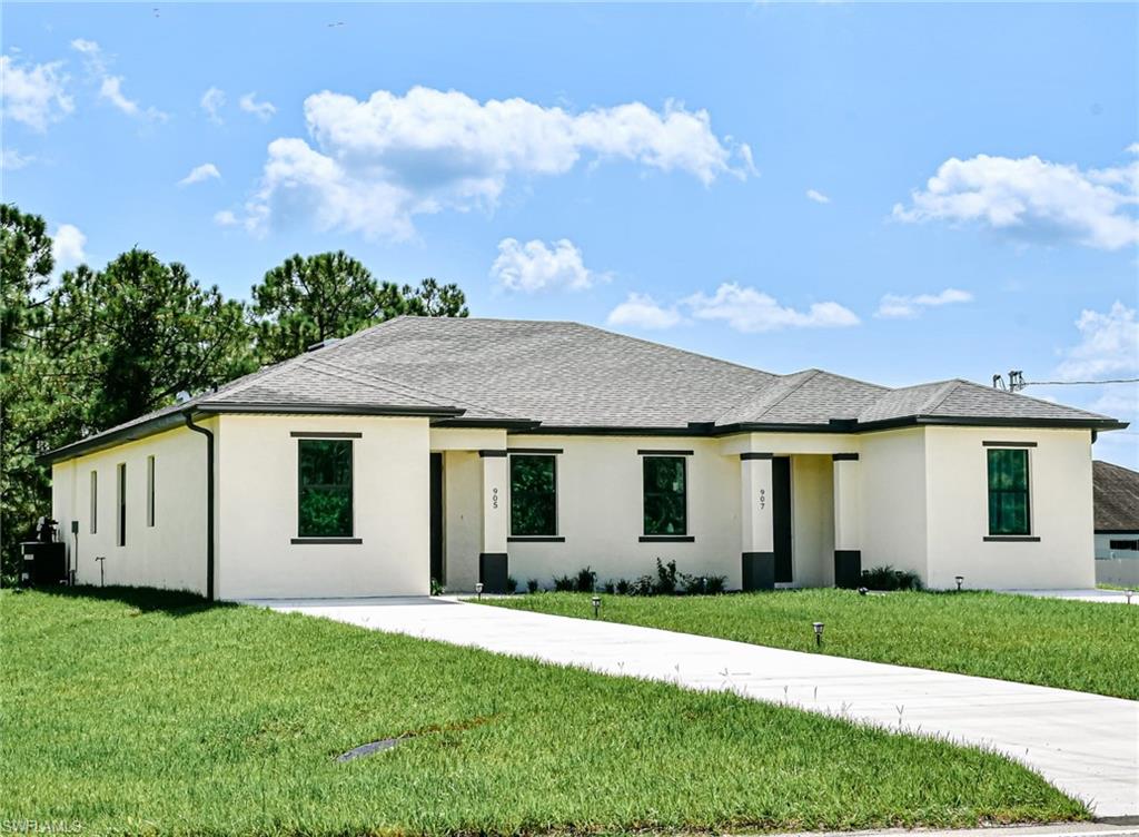 Beautiful property with 3 bedrooms and 2 bathrooms each side, hurricane windows and doors, flooring and Quarz