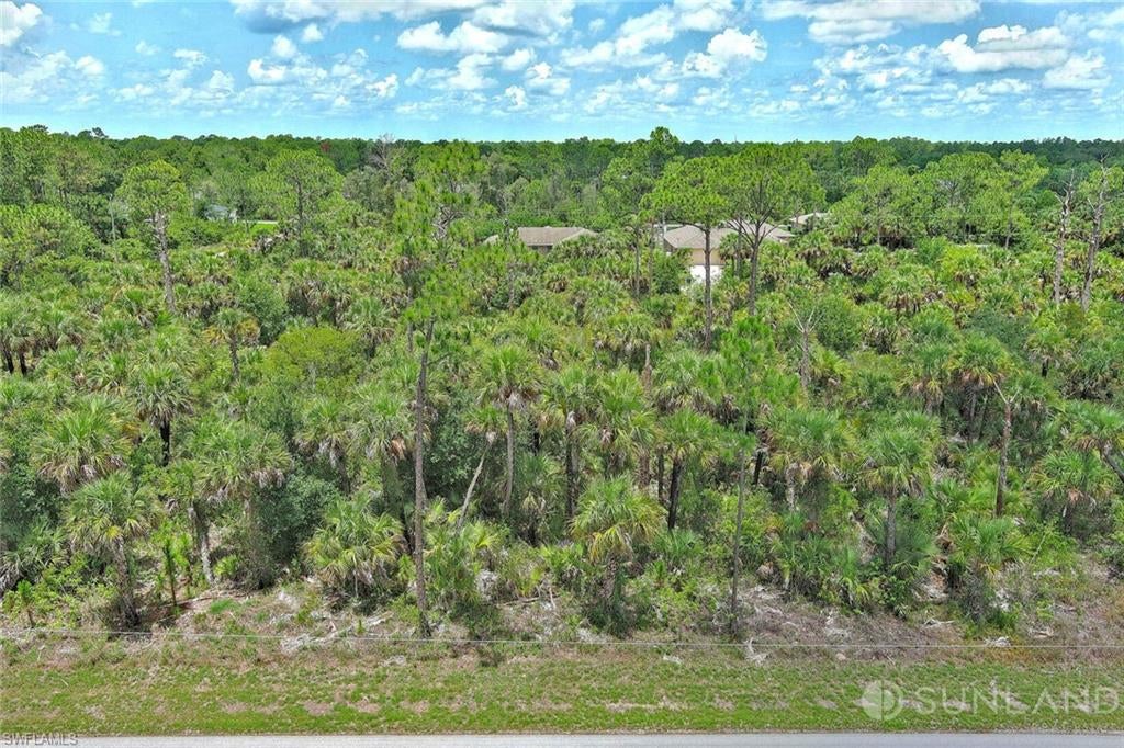 Prime residential lot opportunity in Lehigh Acres, Lee County, located at 131 NAVARRA AVE S, Lehigh Acres, FL 33974. 

Situated in a desirable residential area, this property offers convenient access to Joel Boulevard (approximately 1.82 miles), Charlie R. Matheny Park (2.23 miles), and a gas station (2.18 miles). The lot is located in Flood Zone X, indicating minimal flood hazard (outside the 100- and 500-year floodplains), so building is generally permitted without mandatory flood insurance, elevation requirements, or special floodplain permits. No wetlands nearby means no additional federal, state, or local wetland protections, permitting delays, or mitigation requirements will apply to construction. 

Zoned RS-1 Single Family Residential, the property supports low-density residential use, including single-family detached homes (site-built or modular) by right. ADUs/guest houses possible under FL state law. Mobile/manufactured homes, duplexes, townhomes, multifamily: prohibited (MH or RM districts required). Density: typically 1 unit/acre; no PUD/cluster without rezoning. Buyer should verify all zoning, setbacks, utility availability, and development requirements with Lee County Planning. T

The property is available for a self-guided tour. Subleasing is not permitted. This lot is not available for rent or lease.