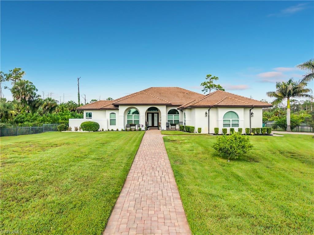 A Rare Naples Estate Offering Luxury, Privacy & Modern Convenience

Discover an exceptional Naples property set on 2.81 acres of fully fenced, 100% upland land, where privacy, security, and modern luxury come together. An automatic gated entrance welcomes you to this impressive estate, offering an ideal combination of space, comfort, and convenience.

Designed for both everyday living and entertaining, the home features a spacious 3-car garage, three A/C units, and advanced smart-home technology, including security cameras throughout the property. A top-of-the-line Connelly pool table is included with the home.

The gourmet kitchen is the heart of the residence, featuring quartz countertops, updated appliances, and an Alexa-enabled refrigerator. The beautifully appointed primary bathroom includes a high-tech smart toilet, while a whole-house reverse osmosis system provides exceptional water quality throughout the home.

The outdoor living space has been extensively upgraded to create a private resort-style retreat. Enjoy an outdoor kitchen, heated saltwater pool, and spa, with pool and spa functions conveniently controllable from your phone. Recent improvements include a new pool heater, new pool enclosure, new pool jets and piping, and a new well pump.

For added protection and peace of mind, the property features hurricane-proof automatic shutters and impact-resistant windows. A generator capable of providing power for up to one month adds an exceptional level of security and preparedness.

Ideally located just off Wilson Blvd, this estate is also positioned near the upcoming Vanderbilt extension, adding to the appeal of this prime Naples location.

With expansive upland acreage, gated privacy, sophisticated smart-home technology, extensive recent upgrades, and exceptional indoor and outdoor amenities, this Naples estate offers an outstanding opportunity to enjoy luxury, comfort, and privacy in a highly desirable setting.