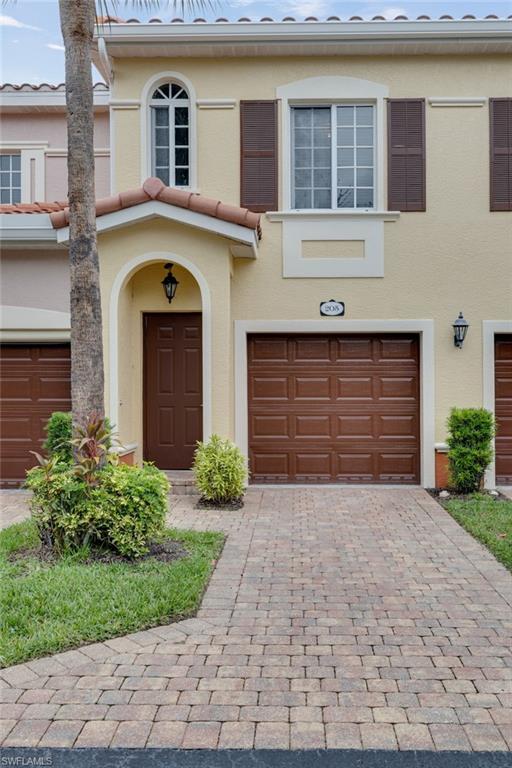 Welcome home to Villagio, one of Estero's most sought-after gated communities. One of Villagio's largest floor plans, this second-floor 2 bedroom 2 bath plus flexible den space easily converts to a 3 bedroom residence offering 1,495 sq ft of comfortable living. A spacious screened lanai extends the living area outdoors with beautiful landscaping and partial lake views. In unit interior laundry and a one-car attached garage gives you the storage and space most condo living gives up. Villagio is gated 24 hours, a new roof completed in 2025 and fresh exterior paint. The low cost $580 monthly fee covers water, Xfinity cable, high-speed wireless internet, building insurance, exterior pest control, and landscaping. Resort-style amenities include pickleball and tennis courts, two swimming pools, a large fitness center, a movie theater, on-site property management, and an on-site café serving a full menu daily. In the heart of Estero on Three Oaks Parkway between Corkscrew Road and Estero Parkway. just minutes to Coconut Point, Miromar Outlets, Gulf Coast Town Center, Hertz Arena, RSW and the Gulf beaches of Southwest Florida. Whether you're looking for a full time residence, a seasonal retreat or an income producing investment opportunity, this is the one!