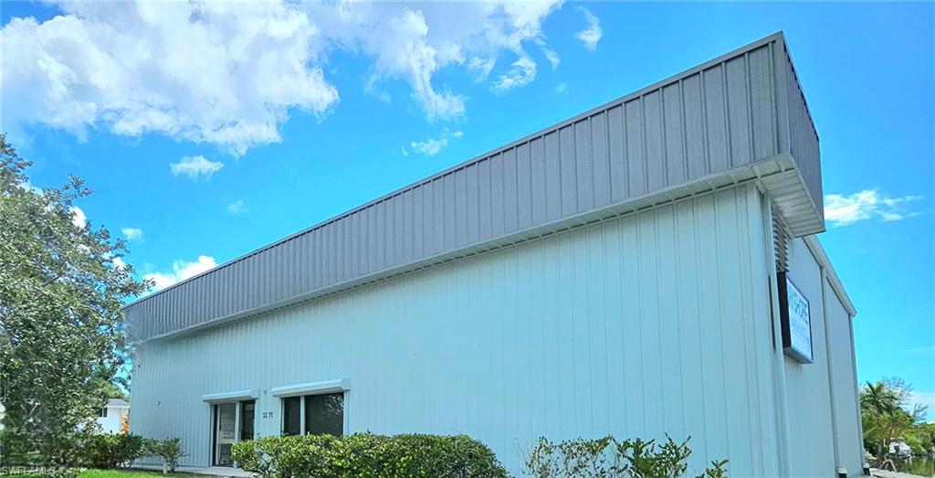3270 Bayshore Drive offering includes the established laundromat business and FF&E, the Bayshore Gallery Rental income and ownership of the waterfront real estate in one transaction. The purchaser acquires current cash flow together with control of a C-4 commercial property providing direct Gulf access with no bridges.

The asset is fully occupied and generates income from two sources. The laundromat operates on 2,481 SF with 18 washers and 22 dryers, sold with all operating FF&E. The Bayshore Gallery occupies the building's second unit — 3,694 SF including a mezzanine level providing $138,000 in annual rental income. Combined operating history spans 38 months, with a 38-month annualized NOI of $286,278 and a 2026 annualized NOI of $274,354.

The laundromat has room to grow beyond its current operation: wash-and-fold, drop-off dry cleaning service, app-based digital payment, and commercial or linen accounts are all additional revenue a new owner could add.

The waterfront frontage totals approximately 80 linear feet, unrestricted and bridge-free to the Gulf. Zoned C-4 with the BZO-NC overlay, the 0.42-acre site keeps the door open to a wide range of possibilities alongside continued commercial use. From possibly building out a marina to developing the approximately 1,000 SF waterfront patio, among other options.  In-place business and rental income can carry the asset while an owner weighs that future direction, within a trade area boasting an average household income of $146,181 and a population of 52,024 within 3 miles.

The property sits in the Bayshore District, widely regarded as one of the most in-demand submarkets in Naples and a frequent subject of local press coverage on its growth. The district recorded 15.7% taxable-value growth in 2025 and is adding 180 residences across three nearby projects, from luxury condominiums to single-family homes. In February 2027, the "Cars on 5th" Concours relocates to Bayshore Drive, bringing an estimated 750+ vehicles and significant visitor traffic directly past the property. Gulfshore Business, WINK News and Coastal Breeze News have all covered the corridor's redevelopment and the property's own tenants calling the laundromat the "grooviest" in Naples.  WINK News spotlighted the Bayshore Gallery's unveiling of "Resonance" — a massive, hand-cut glass mosaic masterpiece making its stunning debut at Bayshore and Naples Daily News profiled the women driving Bayshore Drive's transformation into "Naples' coolest neighborhood"

The sale includes the real estate, the laundromat business and its operating FF&E, and the second Bayshore Gallery Unit. financial statements and equipment list are available to qualified purchasers upon execution of an NDA.  Listing broker owns the real estate and the laundromat business and has ownership interests in the Bayshore Gallery.